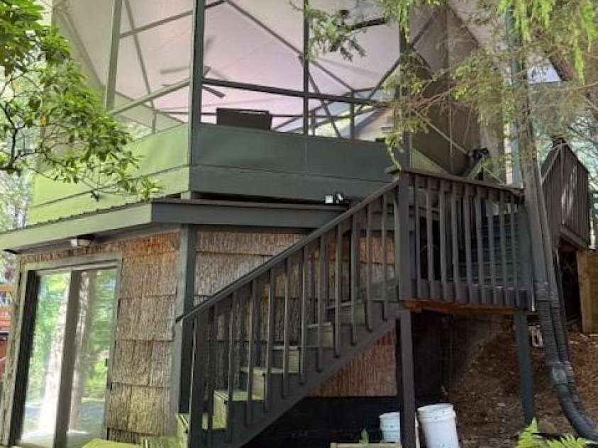 26 Cumberland Drive, Lake Toxaway, NC 28747.  MLS# CAR4262953, YatesRealty ID 21021. Lower level entrance