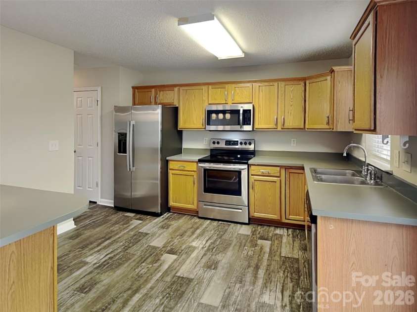 1032 Meadowbrook Lane, Concord, NC 28027.  MLS# CAR4380662, YatesRealty ID 21023. 