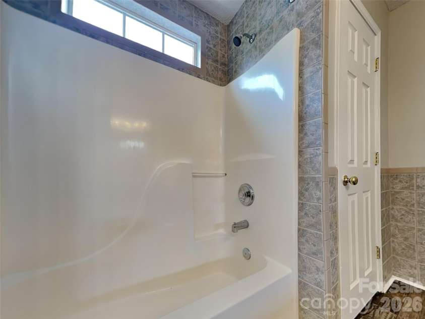 1032 Meadowbrook Lane, Concord, NC 28027.  MLS# CAR4380662, YatesRealty ID 21023. Primary bathroom