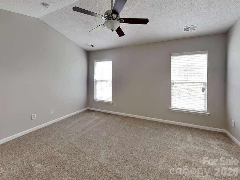 1032 Meadowbrook Lane, Concord, NC 28027.  MLS# CAR4380662, YatesRealty ID 21023. Primary bedroom