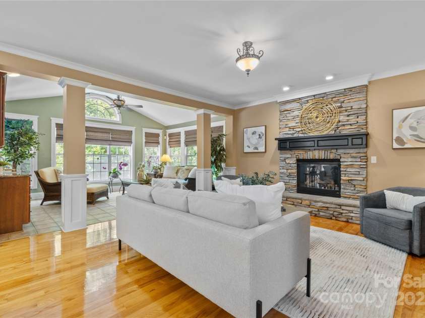 1336 Dobson Drive, Waxhaw, NC 28173.  MLS# CAR4267280, YatesRealty ID 21026. Beautiful family room with stone fireplace