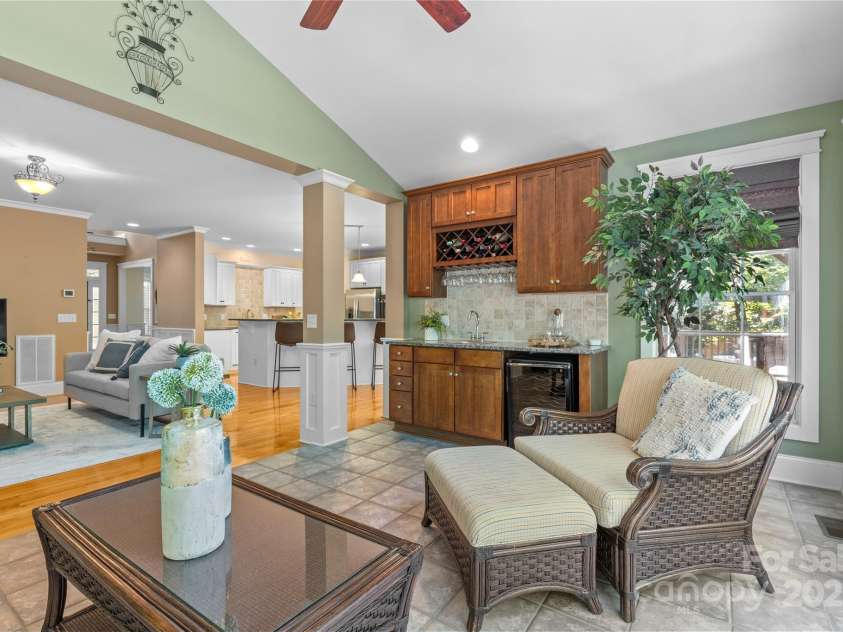 1336 Dobson Drive, Waxhaw, NC 28173.  MLS# CAR4267280, YatesRealty ID 21026. Bright Sunroom with wetbar