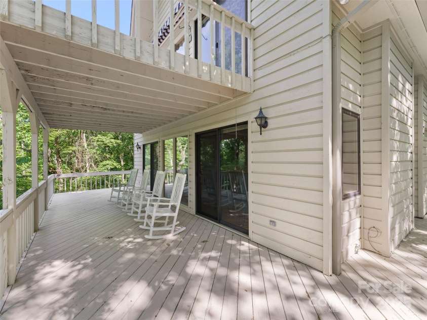 43 Hungryneck Hollow Lane, Saluda, NC 28773.  MLS# CAR4268230, YatesRealty ID 21027. Main Level Porch and second Level Balcony