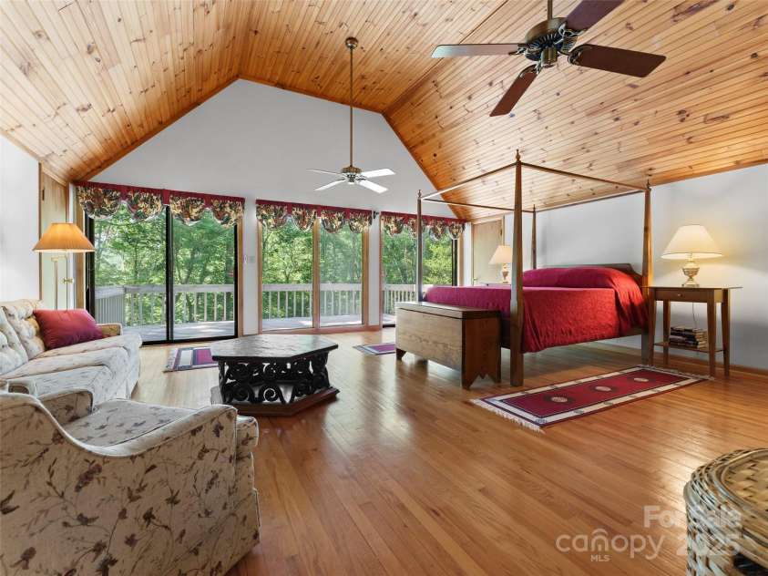 43 Hungryneck Hollow Lane, Saluda, NC 28773.  MLS# CAR4268230, YatesRealty ID 21027. Second level bedroom balcony entrance