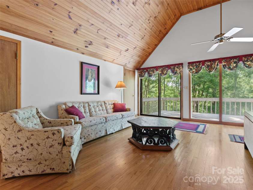43 Hungryneck Hollow Lane, Saluda, NC 28773.  MLS# CAR4268230, YatesRealty ID 21027. Second level bedroom with view of Balcony