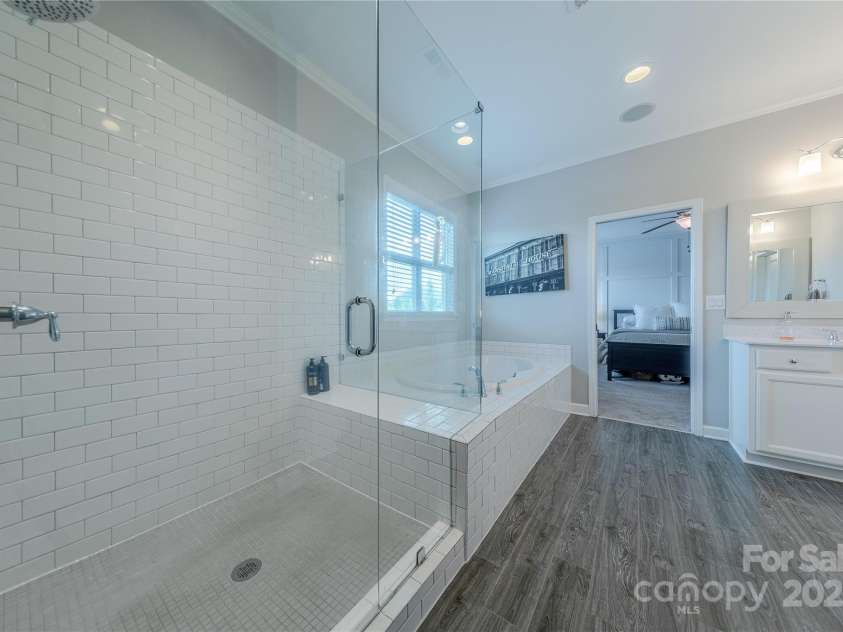 5256 Meadowcroft Way, Fort Mill, SC 29708.  MLS# CAR4270584, YatesRealty ID 21030. Separate Walk-In Closets with Custom Closet Systems