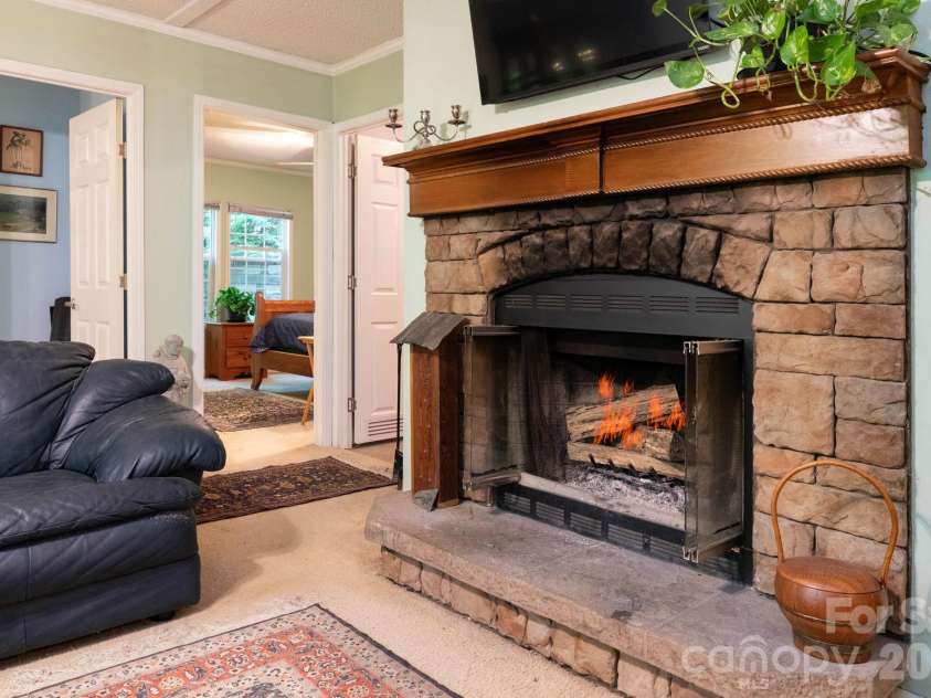 159 Marcellina Drive, Fairview, NC 28730.  MLS# CAR4377799, YatesRealty ID 21031. Fire edited for visual. 