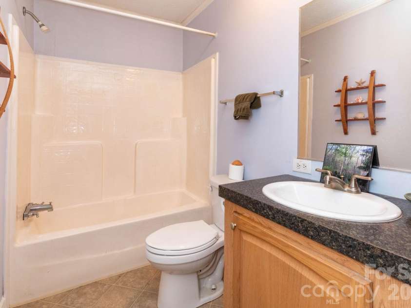 159 Marcellina Drive, Fairview, NC 28730.  MLS# CAR4377799, YatesRealty ID 21031. Guest bathroom 