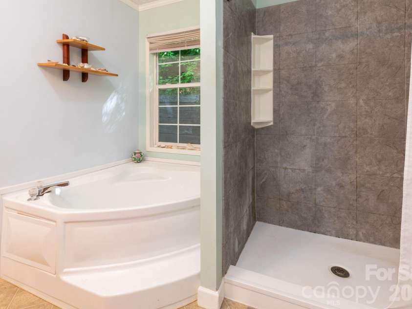159 Marcellina Drive, Fairview, NC 28730.  MLS# CAR4377799, YatesRealty ID 21031. Primary bathroom. 
