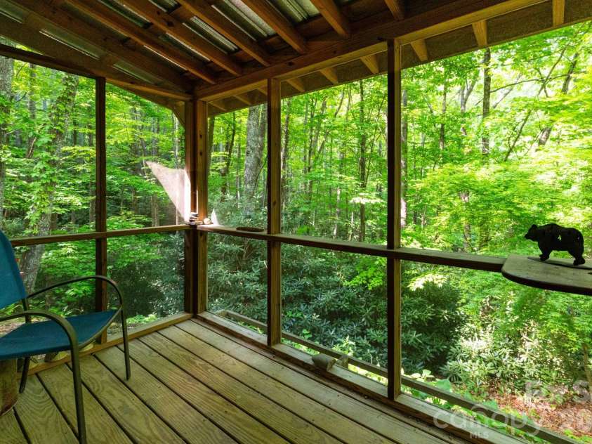 159 Marcellina Drive, Fairview, NC 28730.  MLS# CAR4377799, YatesRealty ID 21031. Screened in front porch. 