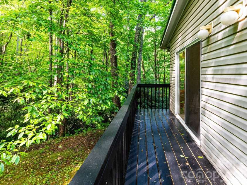 159 Marcellina Drive, Fairview, NC 28730.  MLS# CAR4377799, YatesRealty ID 21031. Sliding door off kitchen. 