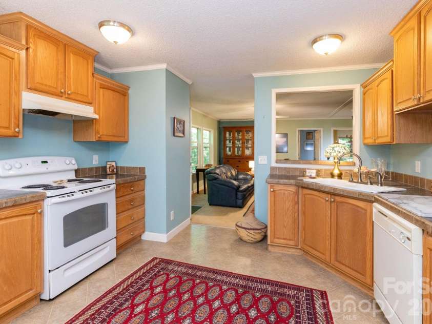 159 Marcellina Drive, Fairview, NC 28730.  MLS# CAR4377799, YatesRealty ID 21031. Spacious kitchen.