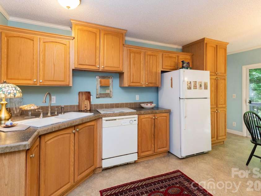 159 Marcellina Drive, Fairview, NC 28730.  MLS# CAR4377799, YatesRealty ID 21031. Spacious kitchen.