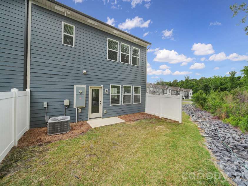 516 Madison Falls Court, Fort Mill, SC 29708.  MLS# CAR4380999, YatesRealty ID 21036. Back Exterior - Private Backyard