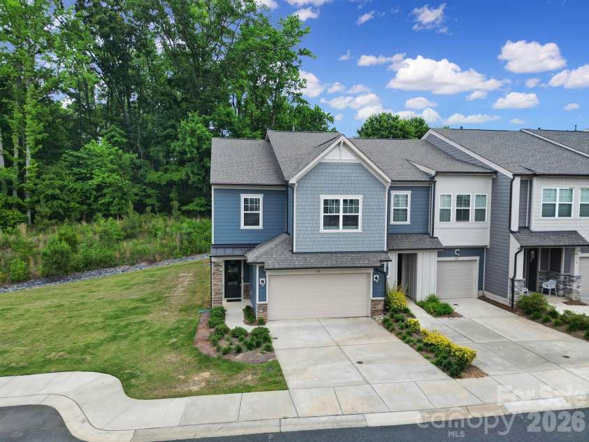 516 Madison Falls Court, Fort Mill, SC 29708.  MLS# CAR4380999, YatesRealty ID 21036. Front Exterior - End Unit, 2 Car Garage, Private Backyard, Next to Green Space
