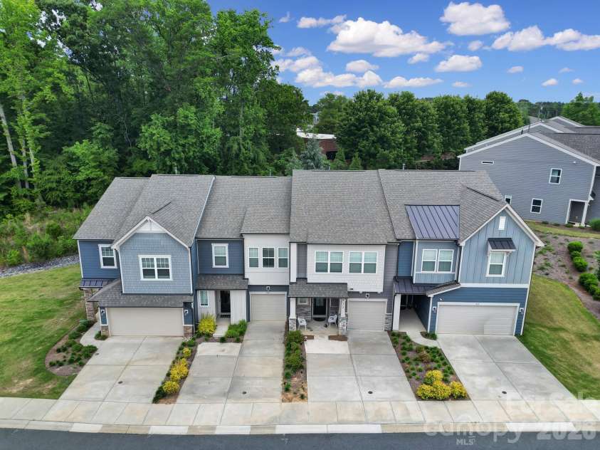 516 Madison Falls Court, Fort Mill, SC 29708.  MLS# CAR4380999, YatesRealty ID 21036. Front Exterior - End Unit, 2 Car Garage, Private Backyard, Next to Green Space