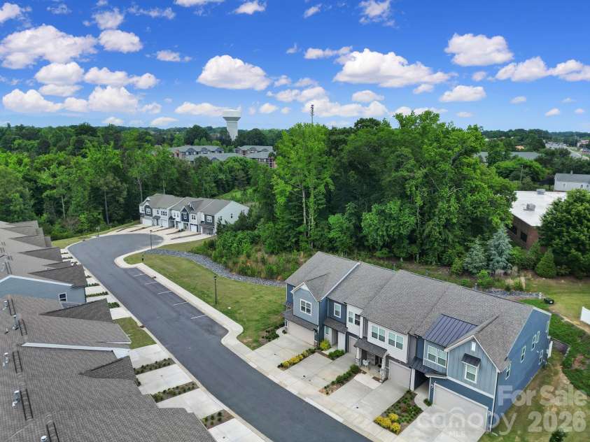 516 Madison Falls Court, Fort Mill, SC 29708.  MLS# CAR4380999, YatesRealty ID 21036. Front Exterior - End Unit, 2 Car Garage, Private Backyard, Next to Green Space