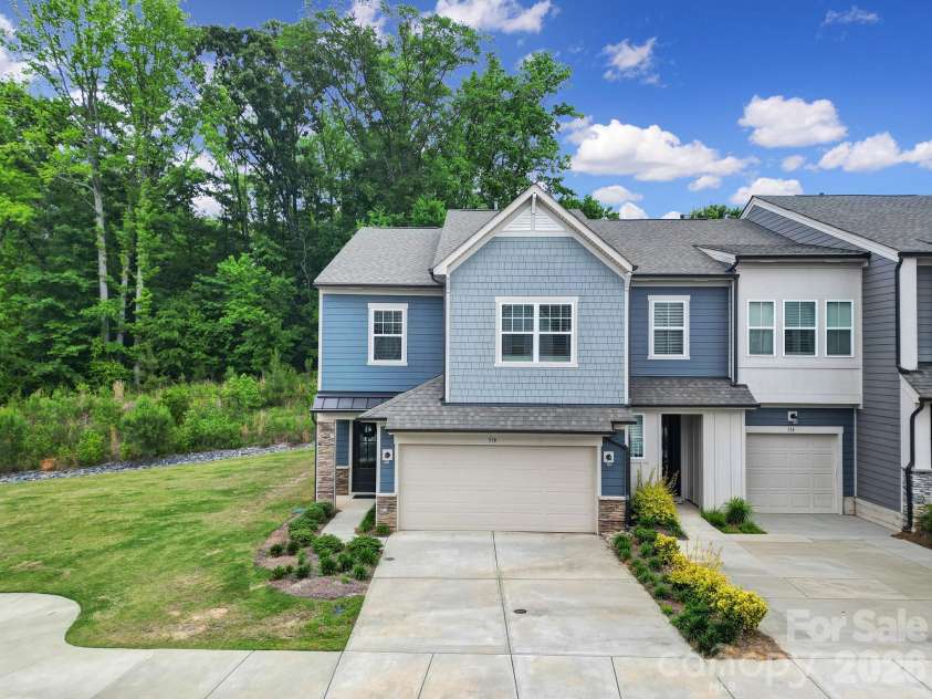 516 Madison Falls Court, Fort Mill, SC 29708.  MLS# CAR4380999, YatesRealty ID 21036. Front Exterior - End Unit, 2 Car Garage, Private Backyard, Next to Green Space
