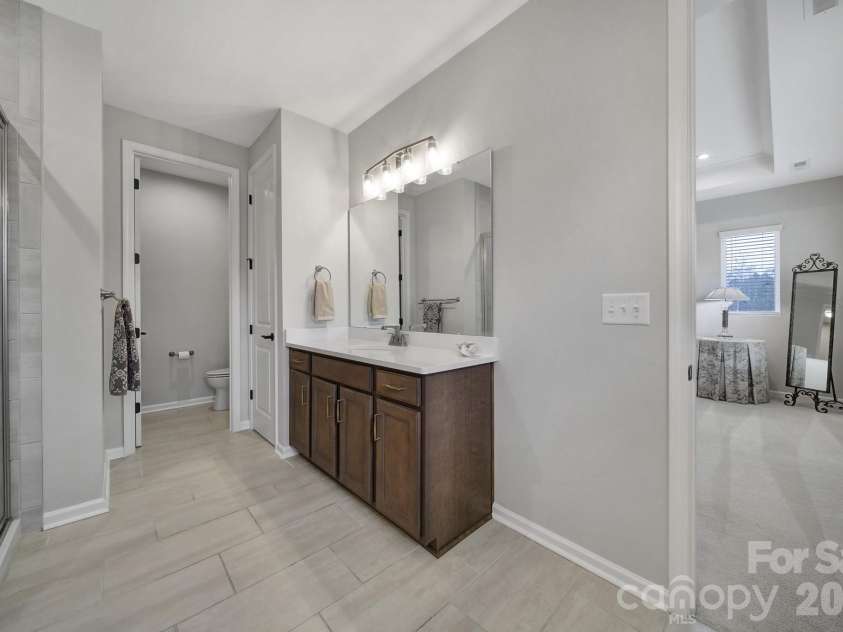 516 Madison Falls Court, Fort Mill, SC 29708.  MLS# CAR4380999, YatesRealty ID 21036. Primary Bathroom