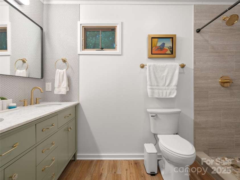 15 Fay Jones Lane, Black Mountain, NC 28711.  MLS# CAR4259163, YatesRealty ID 21038. Brand new primary bathroom with tile shower