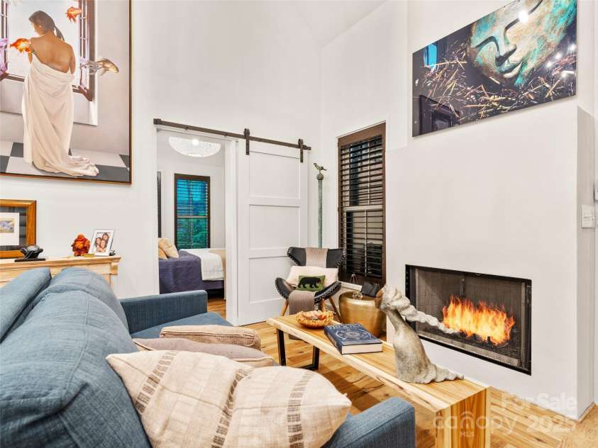 15 Fay Jones Lane, Black Mountain, NC 28711.  MLS# CAR4259163, YatesRealty ID 21038. Cozy gas fireplace