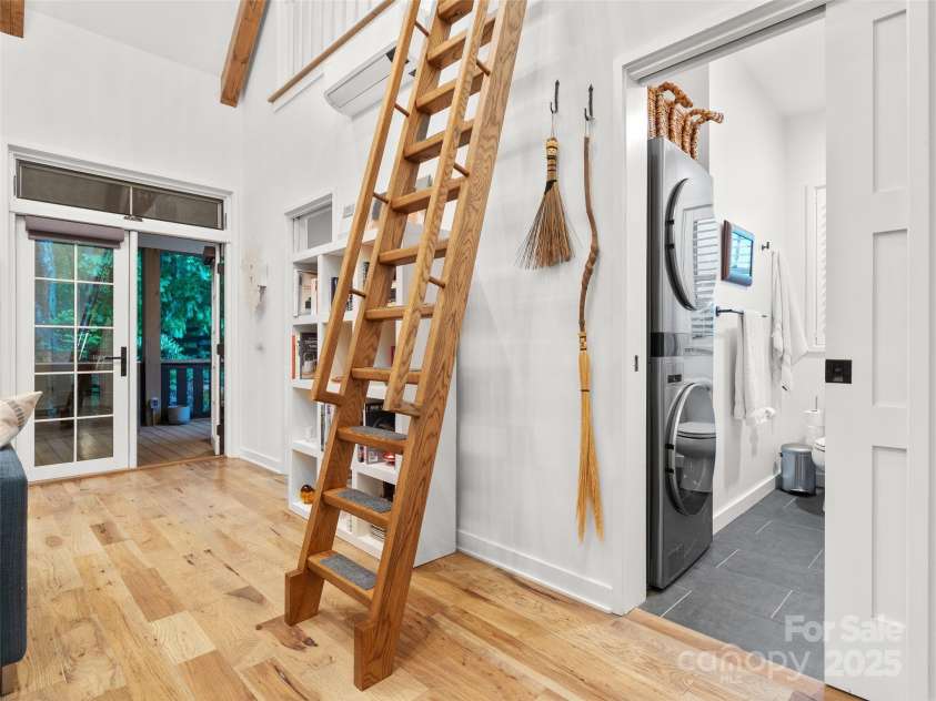 15 Fay Jones Lane, Black Mountain, NC 28711.  MLS# CAR4259163, YatesRealty ID 21038. Laundry in main bathroom