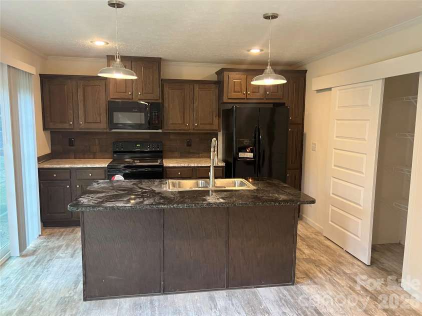 5756 Dalmatian Street, Iron Station, NC 28080.  MLS# CAR3927299, YatesRealty ID 2104. 