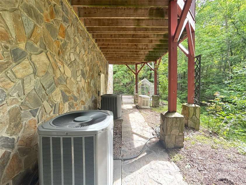 97 Hughes Drive, Maggie Valley, NC 28751.  MLS# CAR4239722, YatesRealty ID 21040. Two heat pumps and generator.