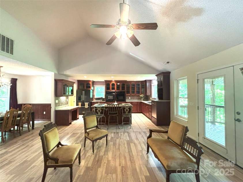 97 Hughes Drive, Maggie Valley, NC 28751.  MLS# CAR4239722, YatesRealty ID 21040. Upstair: Open concept Kitchen, living room and dining area.