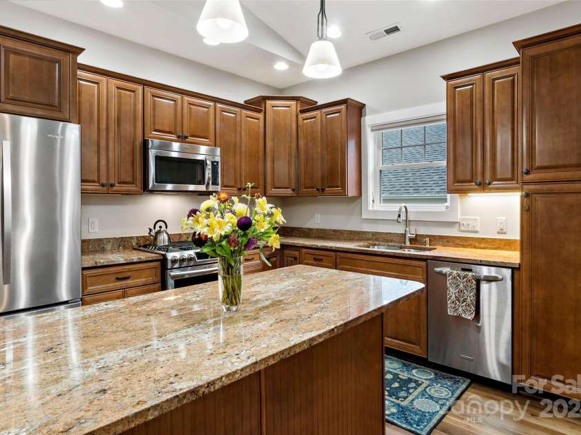 4 Nectar Way, Swannanoa, NC 28778.  MLS# CAR4186169, YatesRealty ID 21041. Kitchen island with room for seating
