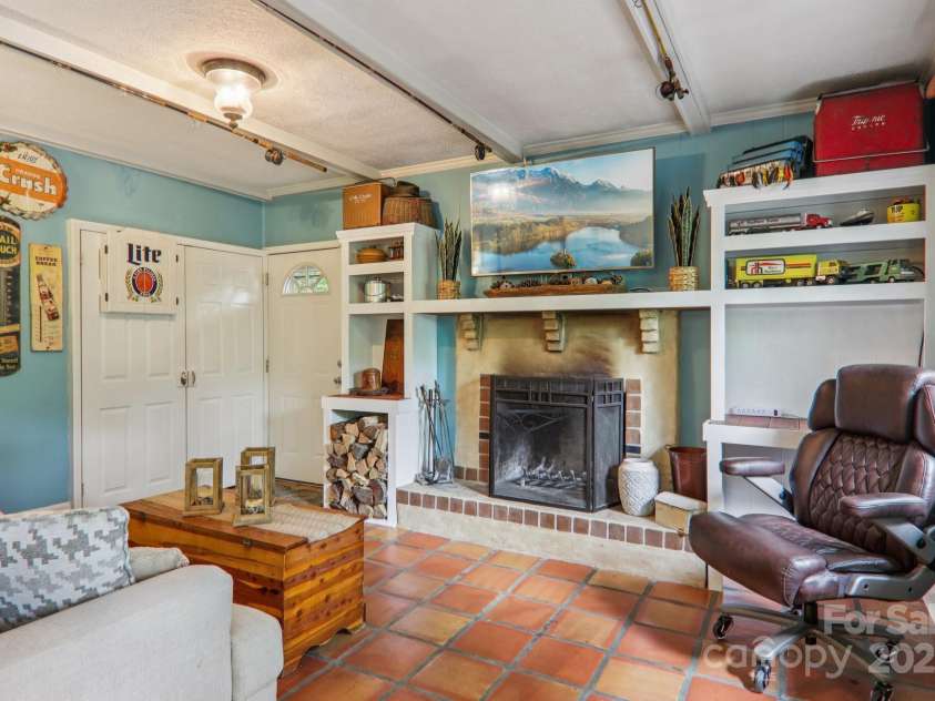 416 Cherokee Avenue, Black Mountain, NC 28711.  MLS# CAR4249629, YatesRealty ID 21049. Cozy Fireplace