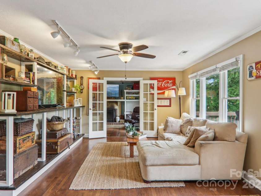 416 Cherokee Avenue, Black Mountain, NC 28711.  MLS# CAR4331920, YatesRealty ID 21049. Living Room > Den