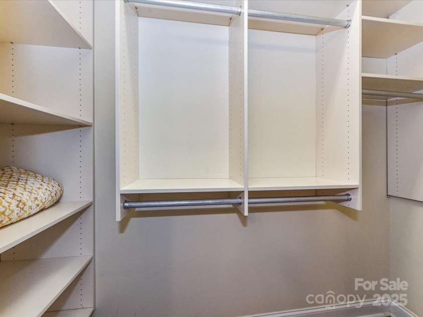 2810 Selwyn Avenue, Charlotte, NC 28209.  MLS# CAR4259900, YatesRealty ID 21050. Built-ins in walk-in closet