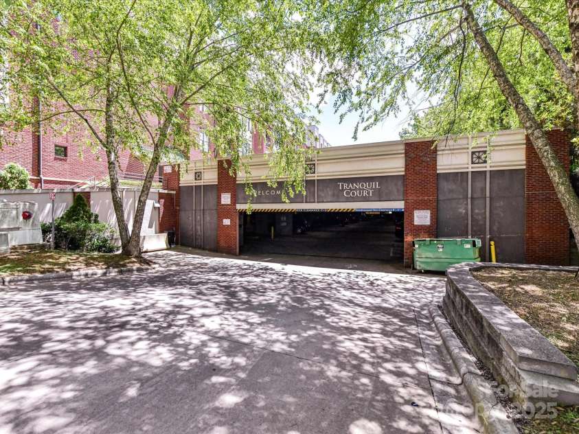 2810 Selwyn Avenue, Charlotte, NC 28209.  MLS# CAR4259900, YatesRealty ID 21050. Parking garage entrance on Tranquil Ave