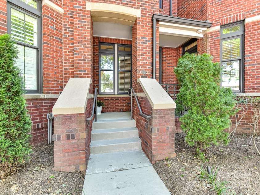 2810 Selwyn Avenue, Charlotte, NC 28209.  MLS# CAR4259900, YatesRealty ID 21050. Rear entrance facing Tranquil Ave for easy outside access!