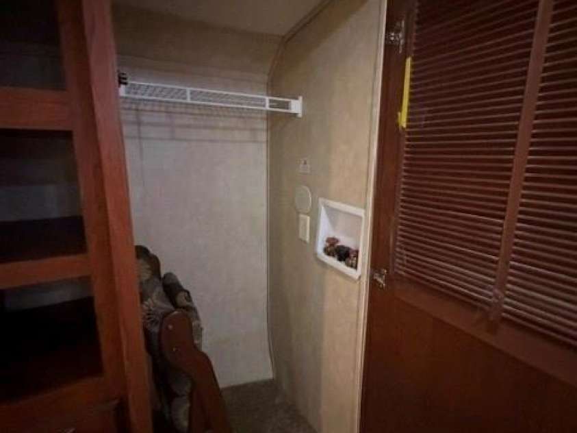 114 Redwood Trail, Mount Gilead, NC 27306.  MLS# CAR4381225, YatesRealty ID 21054. Camper Laundy Closet