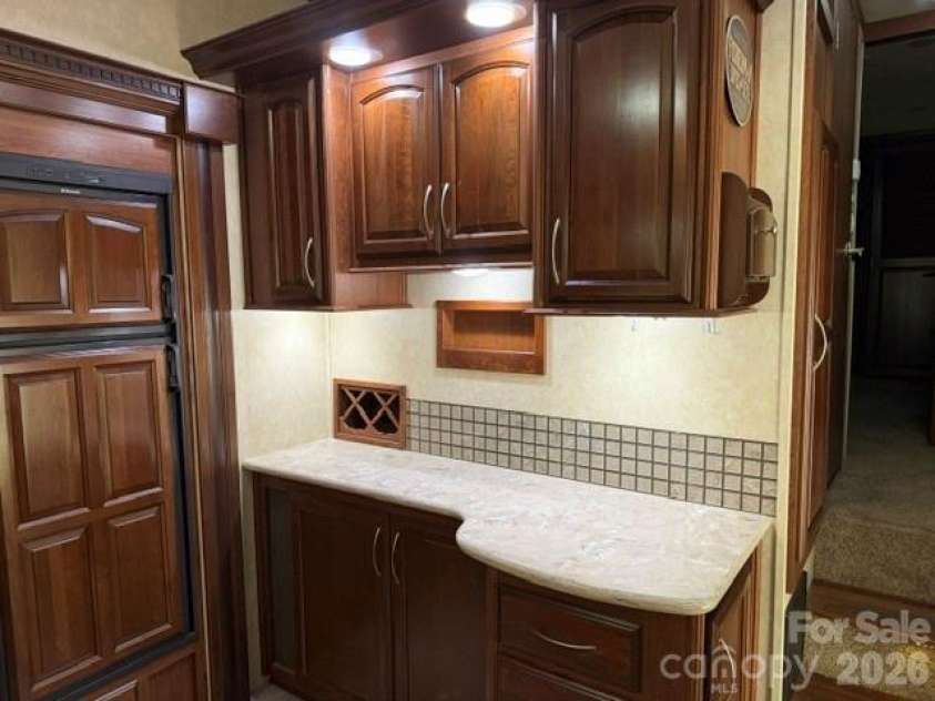 114 Redwood Trail, Mount Gilead, NC 27306.  MLS# CAR4381225, YatesRealty ID 21054. Kitchen Bar Area