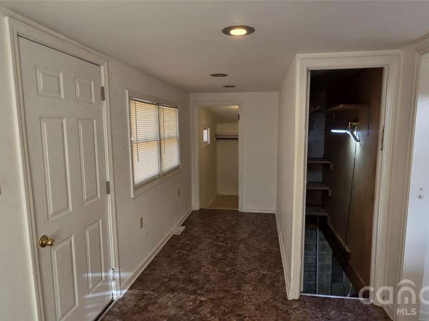 212 Old Dale Road, Spruce Pine, NC 28777.  MLS# CAR4335802, YatesRealty ID 2106. Door to basement and laundry room