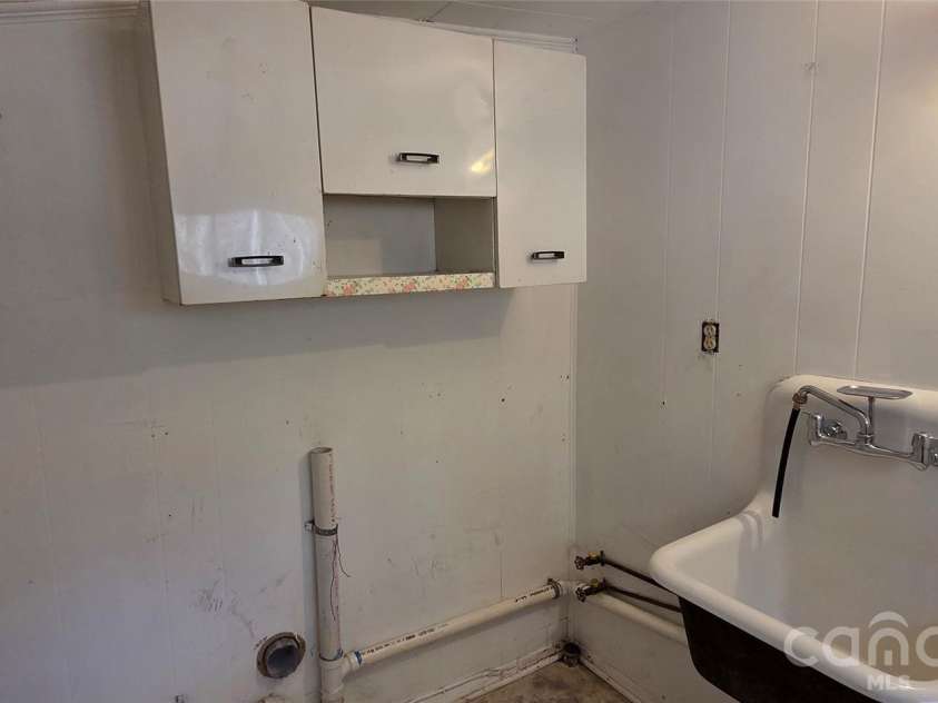 212 Old Dale Road, Spruce Pine, NC 28777.  MLS# CAR4335802, YatesRealty ID 2106. Laundry