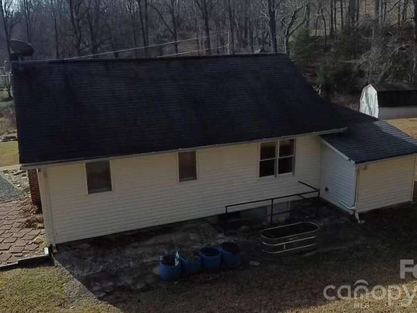 212 Old Dale Road, Spruce Pine, NC 28777.  MLS# CAR4335802, YatesRealty ID 2106. Rear of home