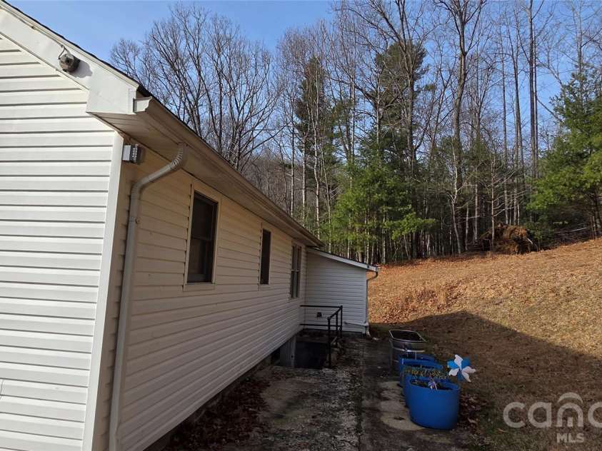 212 Old Dale Road, Spruce Pine, NC 28777.  MLS# CAR4335802, YatesRealty ID 2106. Rear of home