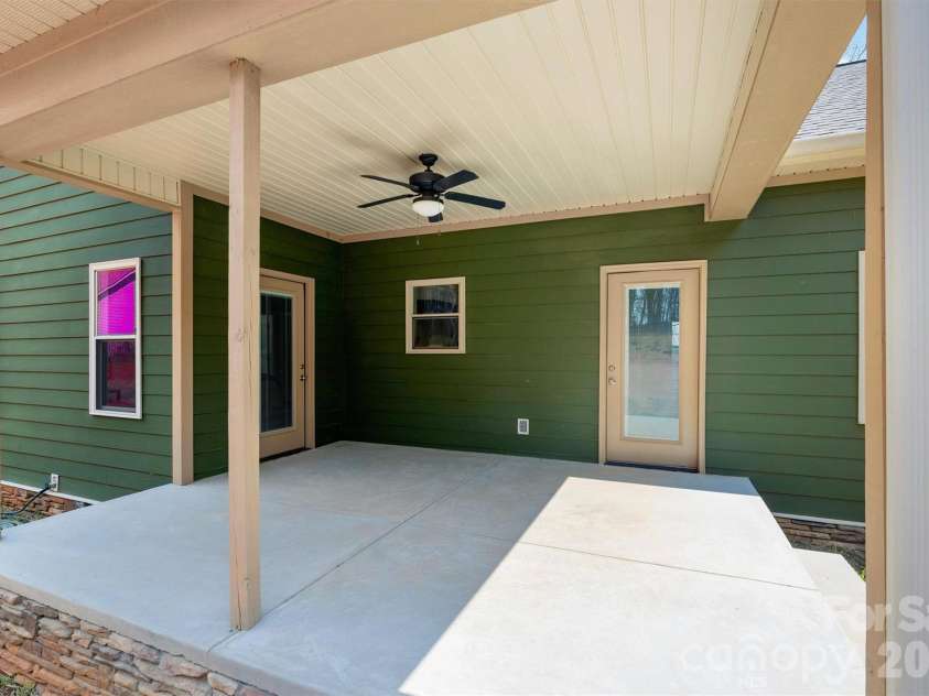 12057 Mariners Cove Court, Lancaster, SC 29720.  MLS# CAR4359140, YatesRealty ID 21066. Back covered porch 