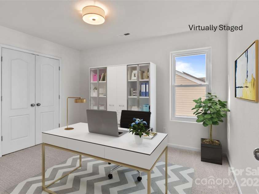 2532 Blue Moss Drive, Dallas, NC 28034.  MLS# CAR4271917, YatesRealty ID 21069. One of three additional bedrooms on second floor of home staged as a home office.
