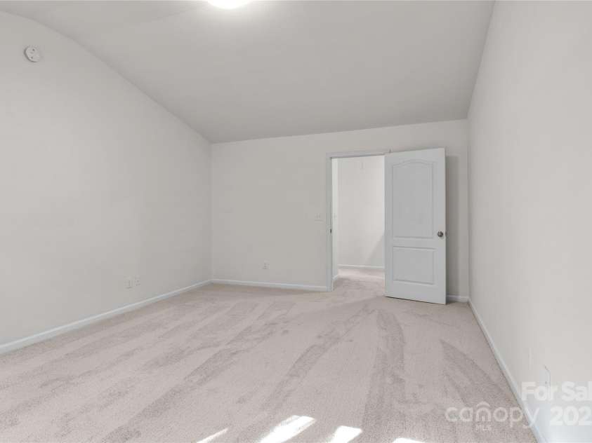 2532 Blue Moss Drive, Dallas, NC 28034.  MLS# CAR4271917, YatesRealty ID 21069. Primary bedroom has plenty of space for king-size bed.