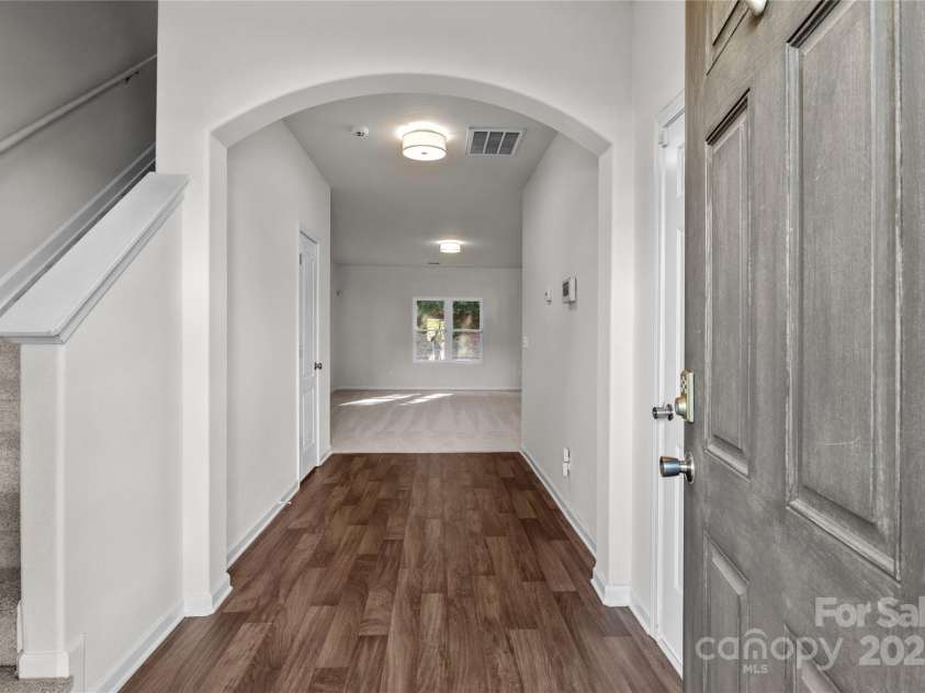 2532 Blue Moss Drive, Dallas, NC 28034.  MLS# CAR4271917, YatesRealty ID 21069. Spacious foyer with arched entry and freshly painted walls and ceiling, new light fixture provides a welcoming introduction to the home.