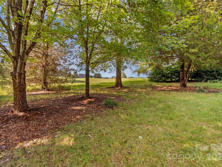 501 Muirfield Way, Salisbury, NC 28144.  MLS# CAR4291542, YatesRealty ID 2107. Backyard looking toward golf course... Comes with an occasional stray golf ball.
