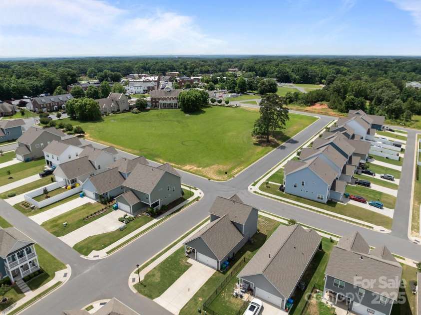 146 Kerri Dawn Lane, Locust, NC 28097.  MLS# CAR4270226, YatesRealty ID 21071. Arial view with park area