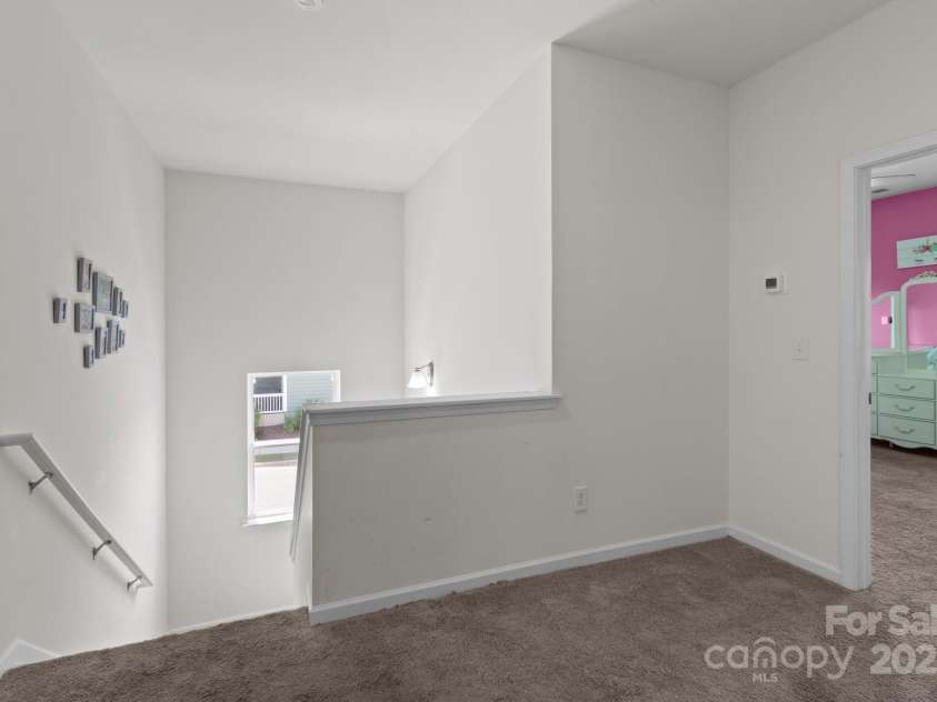 146 Kerri Dawn Lane, Locust, NC 28097.  MLS# CAR4270226, YatesRealty ID 21071. Loft area