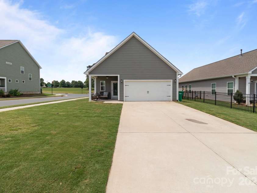 146 Kerri Dawn Lane, Locust, NC 28097.  MLS# CAR4270226, YatesRealty ID 21071. Rear View