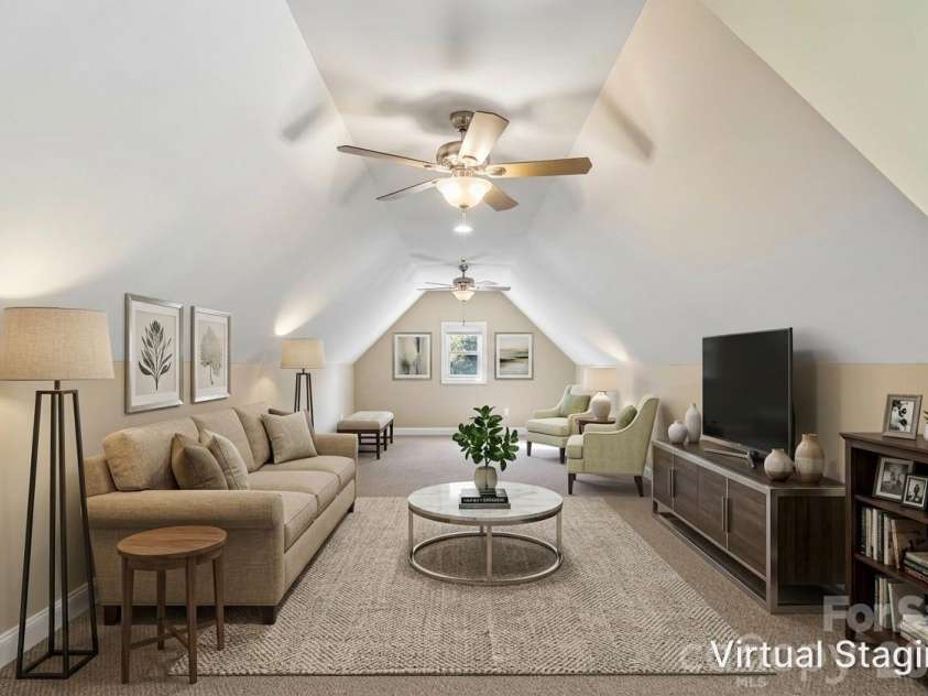 959 Silverglen Way, Hendersonville, NC 28792.  MLS# CAR4397996, YatesRealty ID 21071. Family room virtually staged